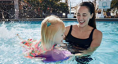 woman and child in pool