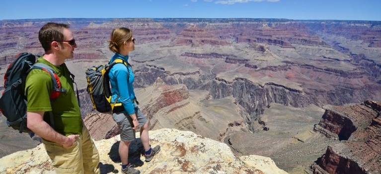 couple hiking at canyon